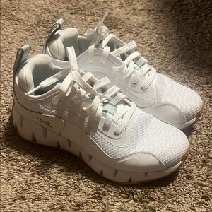 White Athletic Sneakers with Green Accents